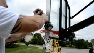 installing-backboard-pad-barbarian-destroyer-basketball-goal