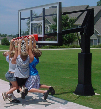 Kids Hanging on Basketball Hoop Rim